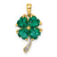 A emerald pendant with four heart shaped emeralds and a beaded center. The stem is made of white gold. 