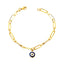 A oval link paperclip chain with evil eye charm dangling in the center of the bracelet. 