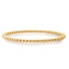 A solid gold beaded stretch bracelet that has gold connecting tubes inside that allows it to have expanding abilities. 