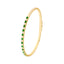 A diamond and emerald alternate stone design bangle. This bangle has gold flex technology and can easily be put onto the wrist. Finished with a secure clasp. 