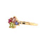 This ring has different shaped colored gemstones curated into on cluster. Set on a thin gold band. 