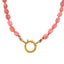 Product picture showing a naturally pink colored gemstone necklace finished with 14k gold findings and clasp. The necklace is hand knotted with pink colored silk string.