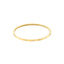 A solid yellow gold hinge bangle with snap closure. The front features seven diamonds evenly spaced out. 