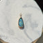 Showing a selection of beautiful blue boulder opals bezel set in solid gold. Each opal is one of a kind with incredible fire and pattern. Showing the oval pendant